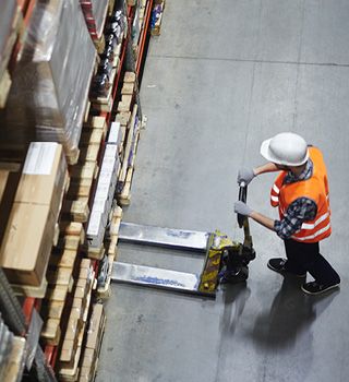 Man in warehouse in safety vest