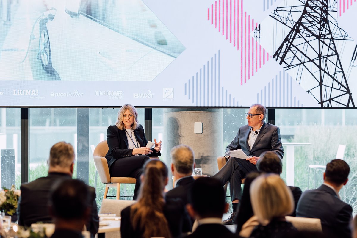 Incoming CEO Giles Gherson on stage with SNC Lavalin's Julianne den Decker at a recent TRBOT event.
