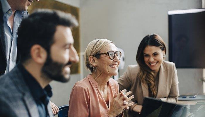 People working together at a meeting.