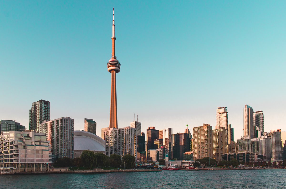 Toronto's waterfront lit by a setting sun.