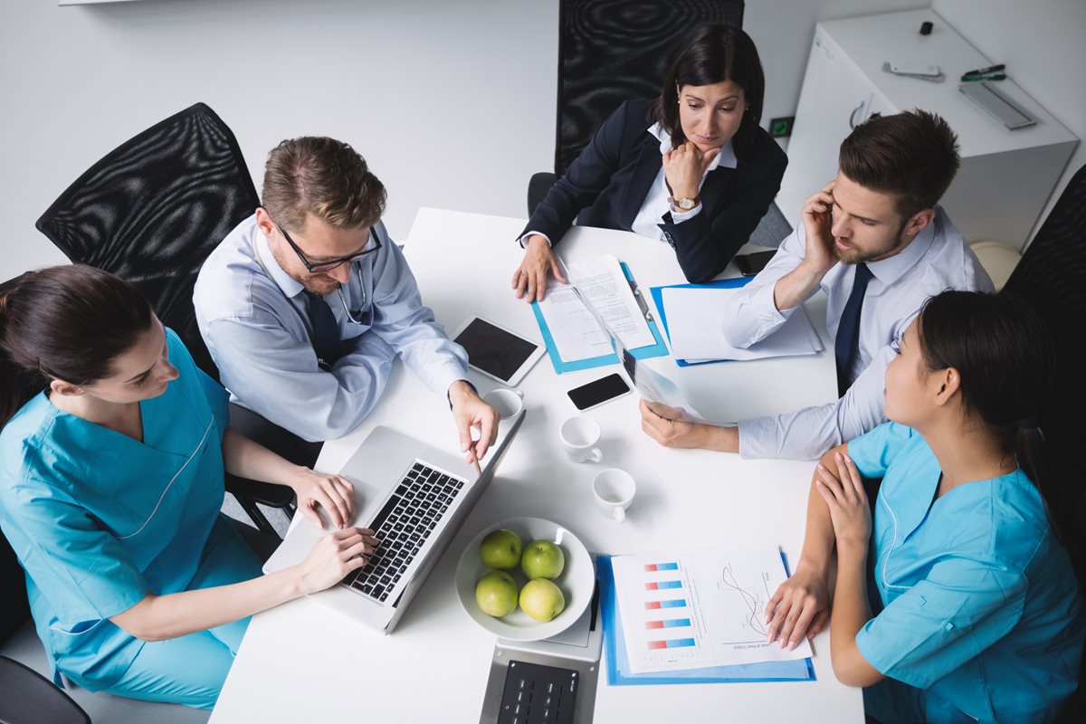 Doctors and Nurses in a business meeting.